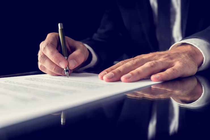 signing-legal-document_254268-697 signing-legal-document_254268-697